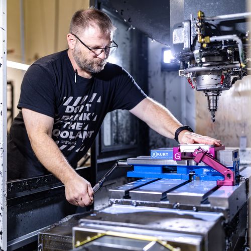 Machinist working on Mill